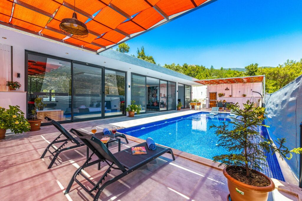 pexels-photo-19075397 Enjoy a relaxing vacation in a luxury villa with a private pool and modern architecture.